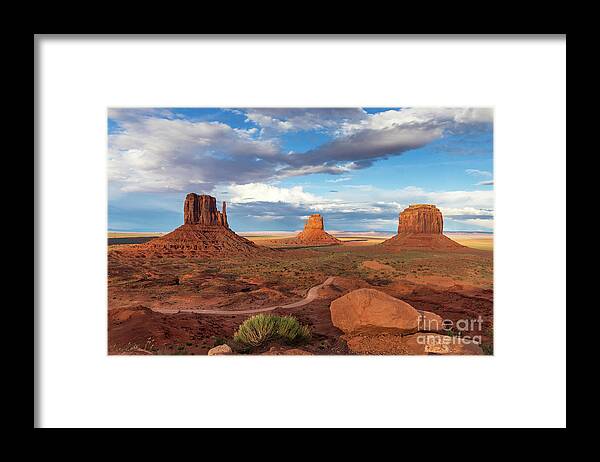 Sunset Framed Print featuring the photograph Sunset Over Monument Valley by Mimi Ditchie
