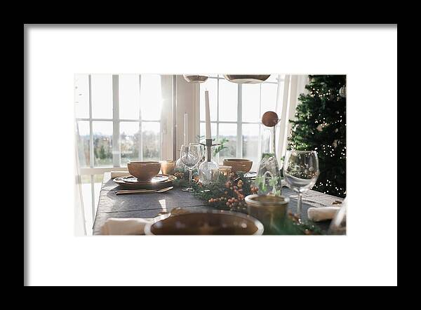 Decoration Framed Print featuring the photograph Tall Candles On A Decorated Dinner Table At Home At Christmas by Cavan Images