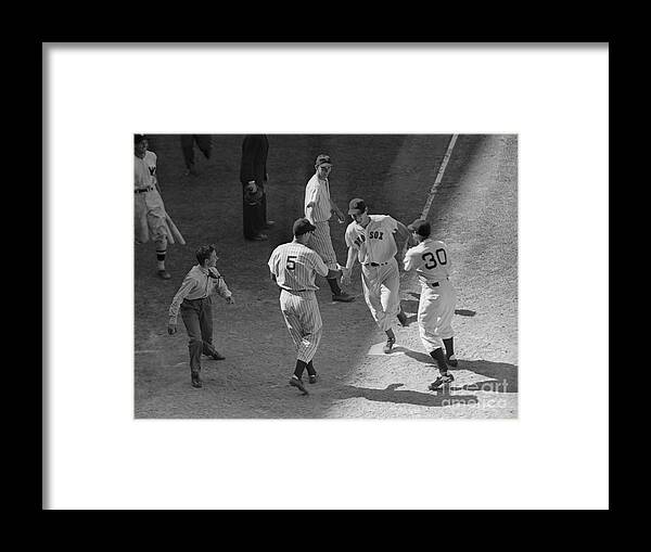 People Framed Print featuring the photograph Ted Williams Crossing The Plate by Bettmann