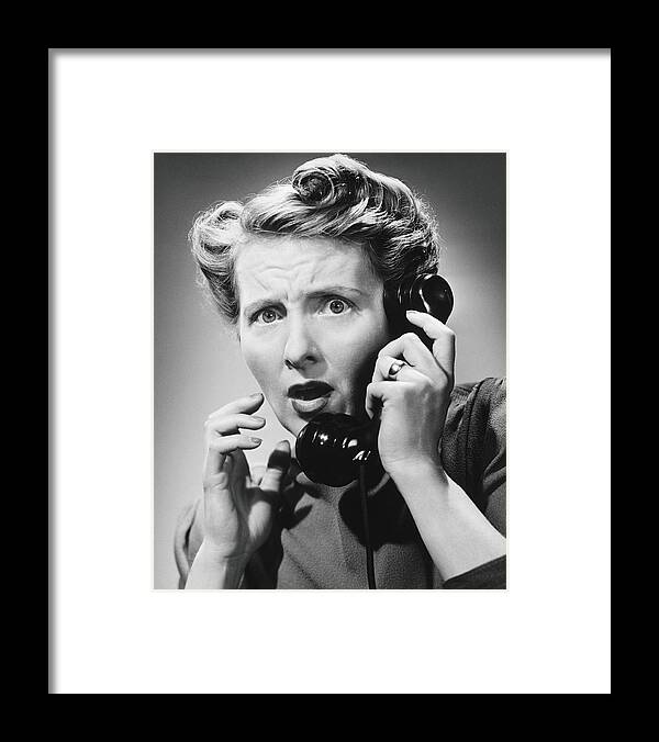 Disbelief Framed Print featuring the photograph Terrified Woman Talking On Phone, B&w by George Marks