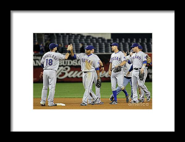 Playoffs Framed Print featuring the photograph Texas Rangers V New York Yankees, Game 4 by Jim Mcisaac