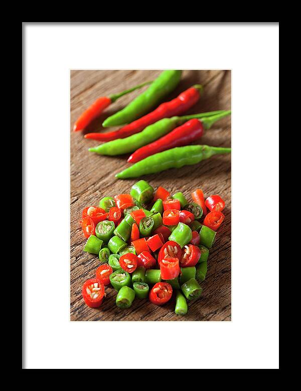 Southeast Asia Framed Print featuring the photograph Thai Red And Green Fresh Market Chili by Enviromantic