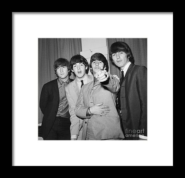 Rock Music Framed Print featuring the photograph The Beatles At The Paramount Theater by Bettmann
