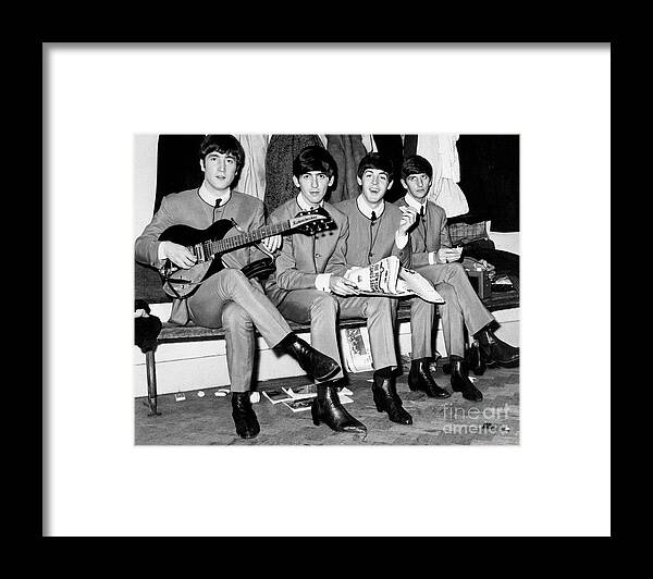 Singer Framed Print featuring the photograph The Beatles Seated On A Bench, 1963 by Bettmann