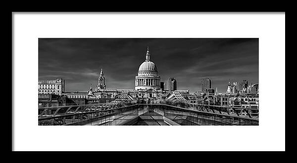 Panorama Framed Print featuring the photograph The Cathedral And The Millennium Bridge by Nader El Assy