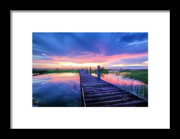 Clouds Framed Print featuring the photograph The Long Dock by Debra and Dave Vanderlaan