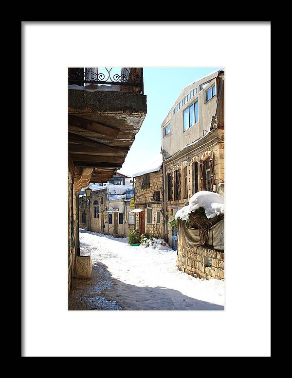  Framed Print featuring the photograph The Old City of Safed in the Galilee in the snow by Alon Mandel
