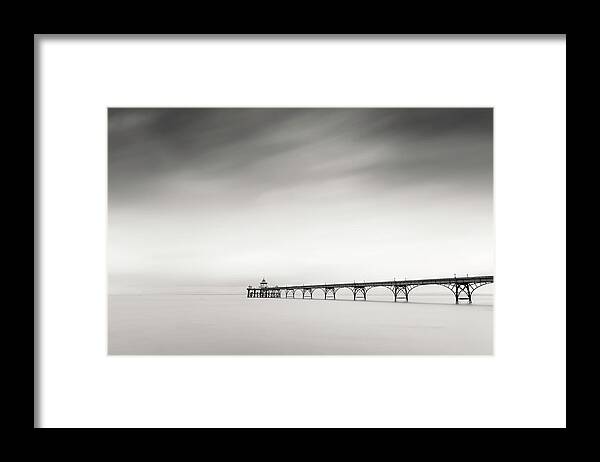 Pier Framed Print featuring the photograph The old Pier by Dominique Dubied