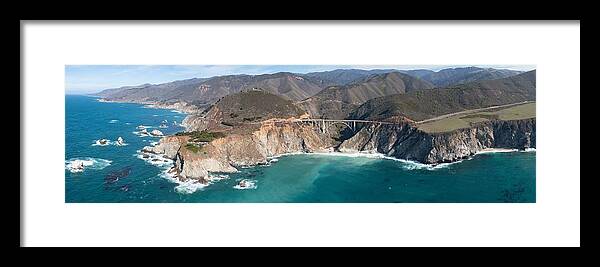 Landscapeaerial Framed Print featuring the photograph The Pacific Ocean Washes Onto by Ethan Daniels