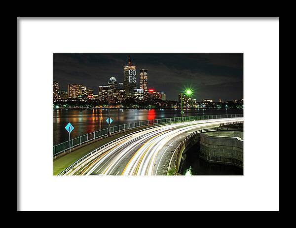 Boston Framed Print featuring the photograph The Pru lit up for the Boston Bruins Boston MA Charles River by Toby McGuire