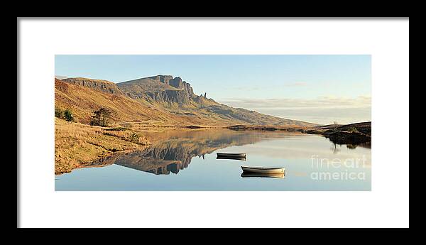 Old Man Of Storr Framed Print featuring the photograph The Storr reflecting in Loch Fada - Panorama by Maria Gaellman