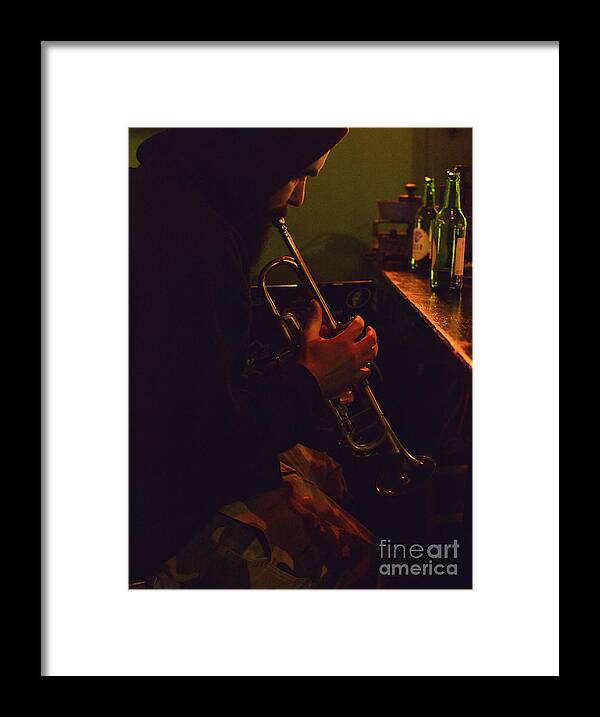 Trumpet Player Framed Print featuring the photograph The Trumpeter by Yavor Mihaylov