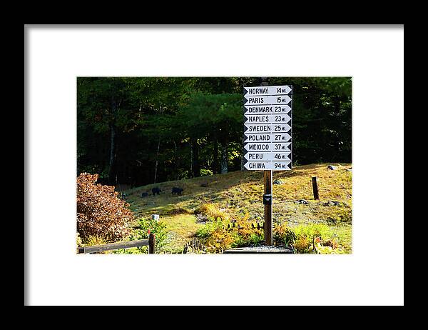 Maine Signpost Framed Print featuring the photograph The world is at your finger tips by Jeff Folger