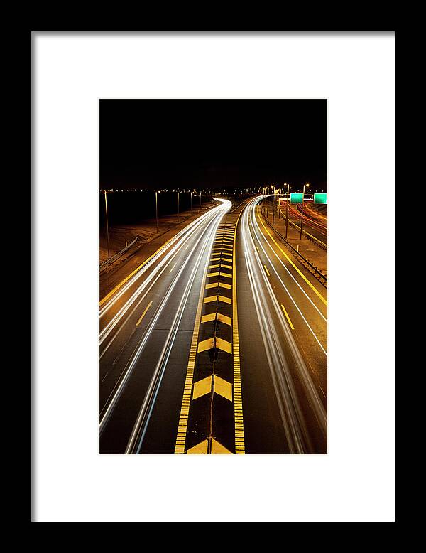 Blurred Motion Framed Print featuring the photograph Time-lapse View Of Traffic On Highway by Henrik Weis