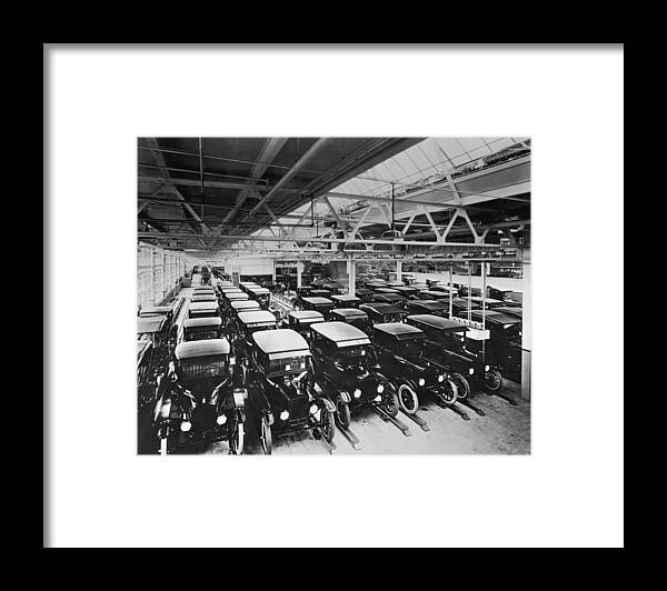 In A Row Framed Print featuring the photograph Tin Lizzy Factory by Hulton Archive