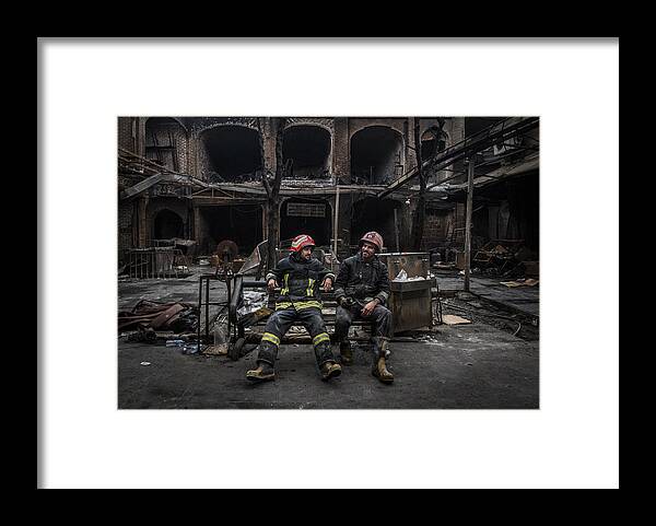 People Framed Print featuring the photograph Tired Of Fire by Amir Ali Navadeh Shahla