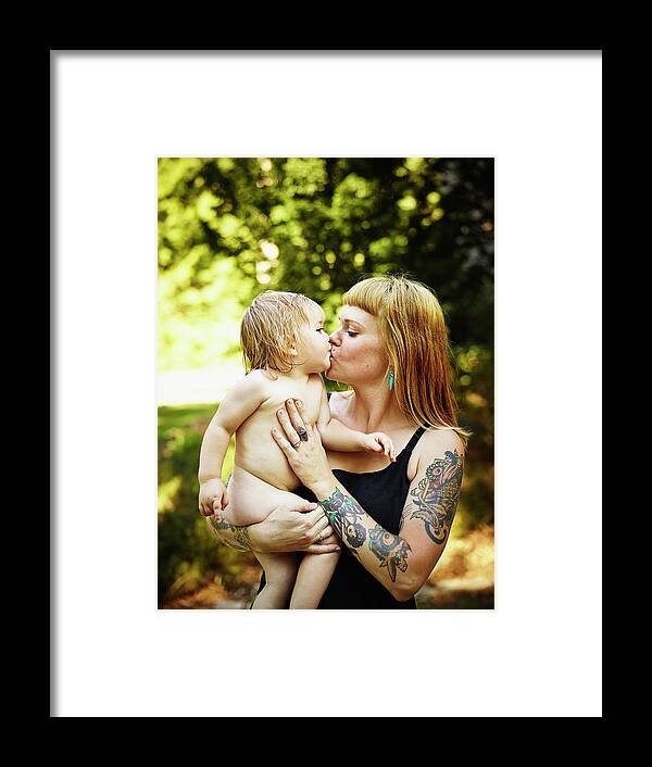 People Framed Print featuring the photograph Toddler Daughter Being Kissed And Held by Thomas Barwick