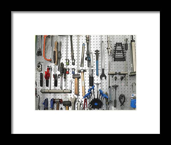 Hanging Framed Print featuring the photograph Tools Hanging From Wall by Michael Blann