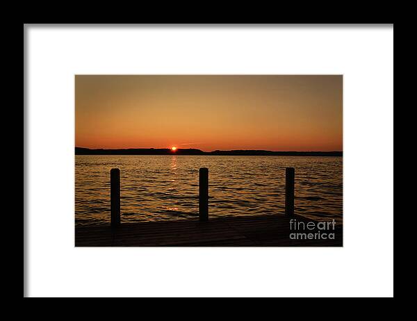 Torch Lake Framed Print featuring the photograph Torch Lake Dockside Sunset by Amy Lucid
