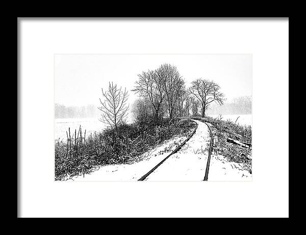  Framed Print featuring the photograph Tracks in Snow by Tom Romeo