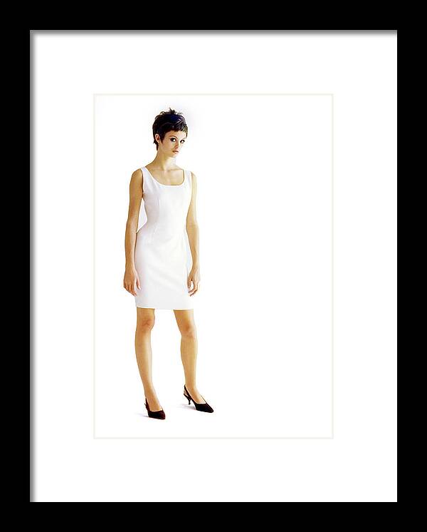 Fashion Framed Print featuring the photograph Trish Goff Wearing A White Dress by Arthur Elgort