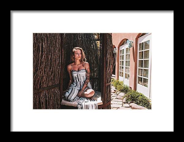 New Mexico Framed Print featuring the photograph Twenty Something Woman Sits Outside Of A Spa In New Mexico by Cavan Images