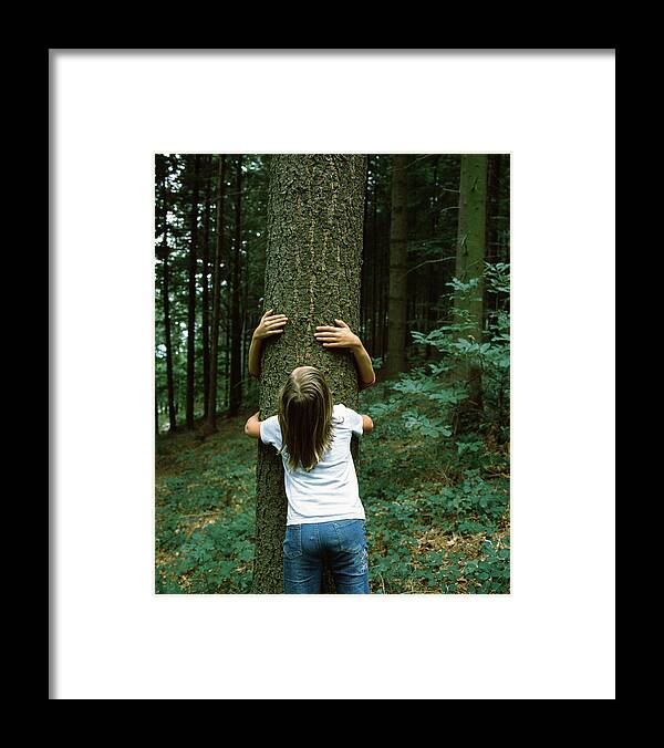 Photography Framed Print featuring the photograph Two Girls Hugging A Tree, Germany by Panoramic Images