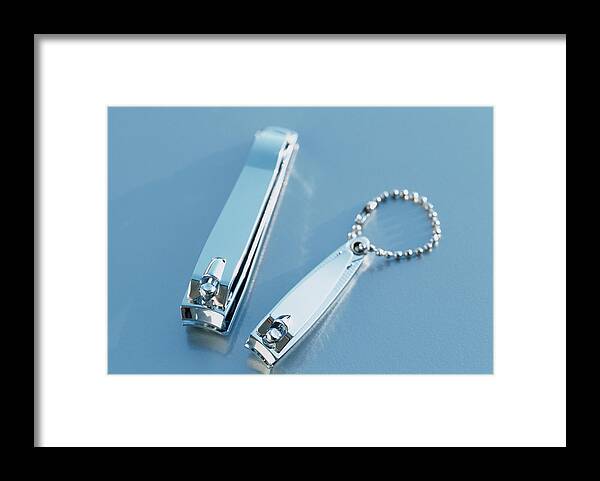 Studio Shot Framed Print featuring the digital art Two Nail Clippers by Zoey
