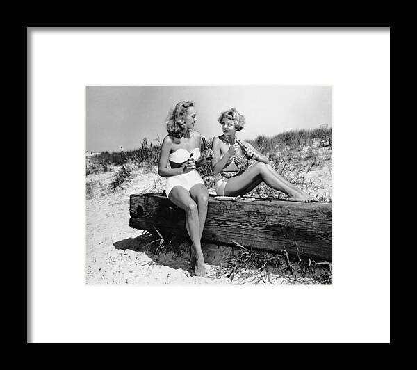 People Framed Print featuring the photograph Two Women Drinking Soda On Beach by George Marks