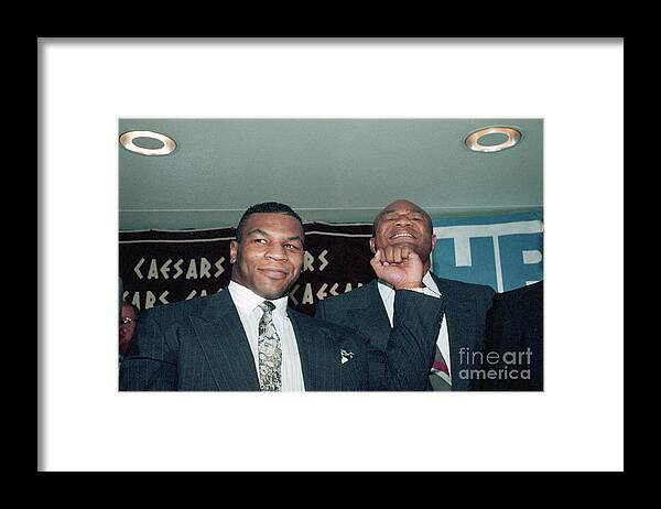People Framed Print featuring the photograph Tyson Pretend Punching George Foreman by Bettmann