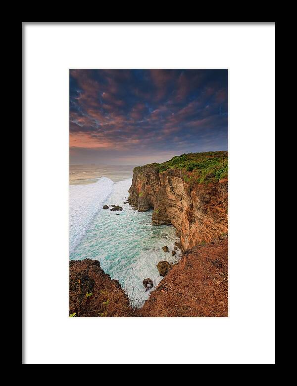Scenics Framed Print featuring the photograph Uluwatu Sunset by Helminadia