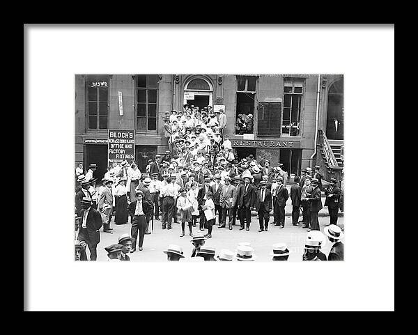 Following Framed Print featuring the photograph Union Garment Workers Outside Polling by Bettmann