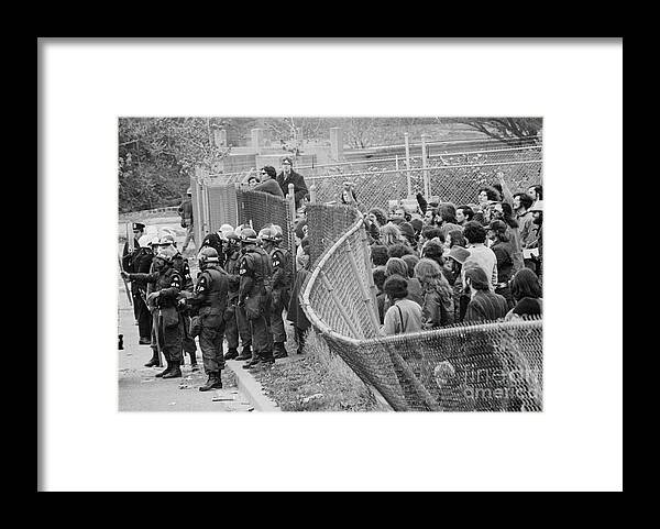 People Framed Print featuring the photograph Unruly Protesting Crowd Damaging Fencing by Bettmann