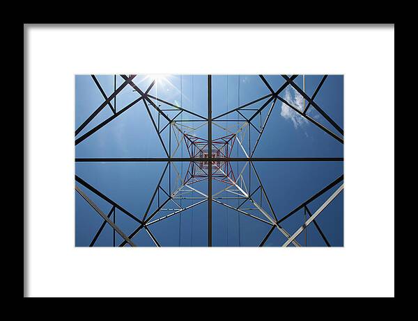 Triangle Shape Framed Print featuring the photograph View Of A Metal Tower From Directly by Caspar Benson