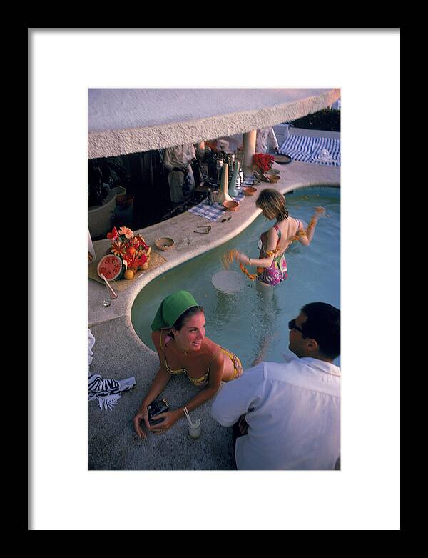 Young Men Framed Print featuring the photograph Villa Vera Pool Bar by Slim Aarons