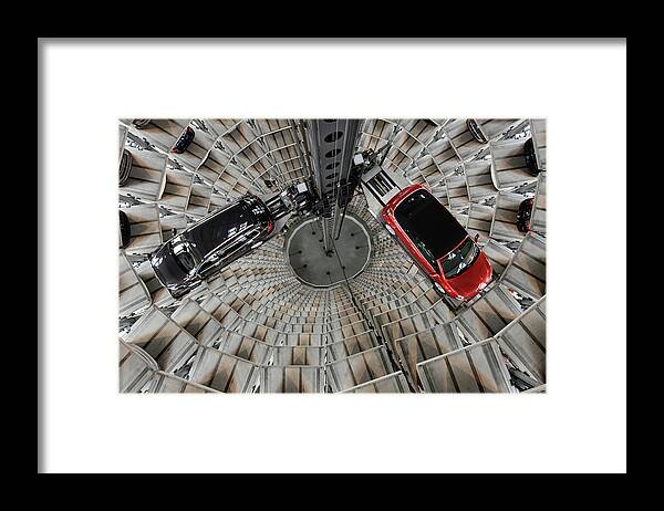 Volkswagen Autostadt Framed Print featuring the photograph Volkswagen Ag Presents Financial by Sean Gallup