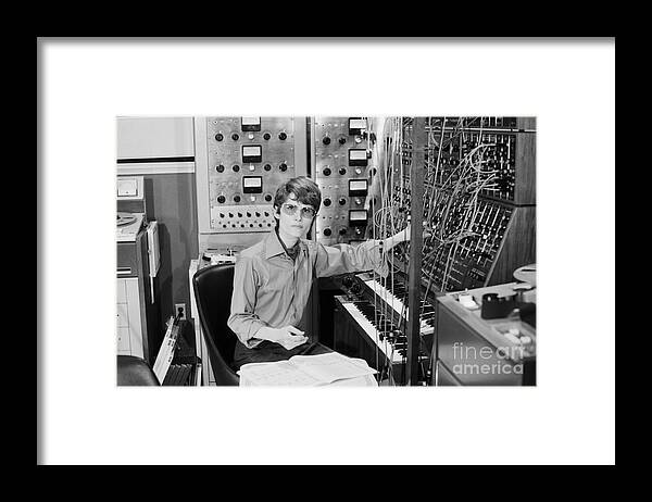 Physicist Framed Print featuring the photograph Walter Carlos Sits At Synthesizer by Bettmann