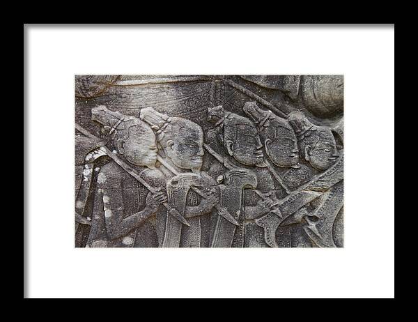Angkor Framed Print featuring the photograph Warriors marching into battle by Steve Estvanik