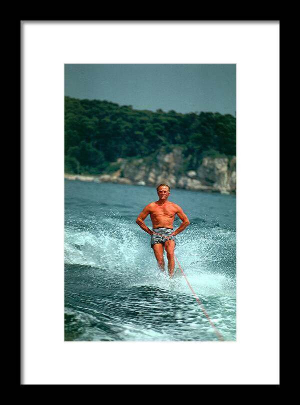 Kirk Douglas Framed Print featuring the photograph Water-skiing Star by Slim Aarons