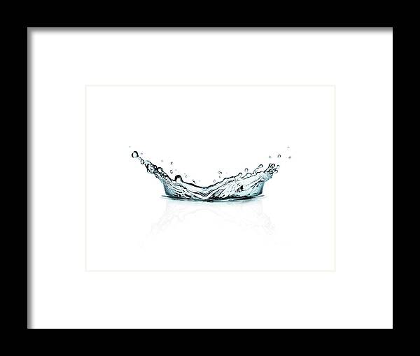 Spray Framed Print featuring the photograph Watersplash Isolated On White Background by Kedsanee