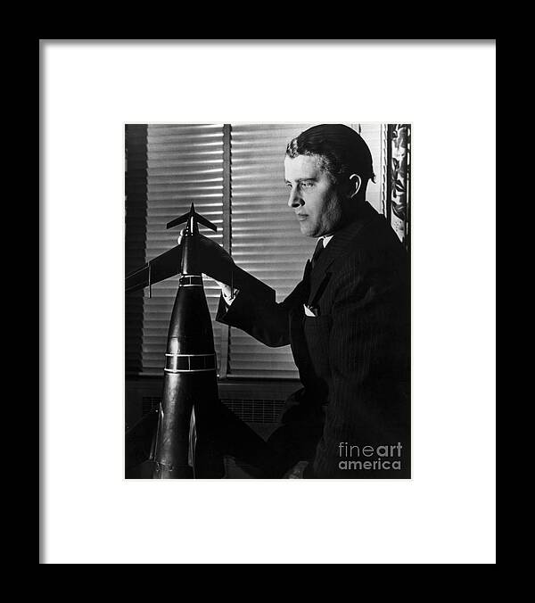 People Framed Print featuring the photograph Werner Von Braun With Model Rocket by Bettmann