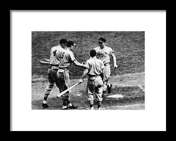 St. Louis Cardinals Framed Print featuring the photograph Whitey Kurowski Comes Home by Hulton Archive