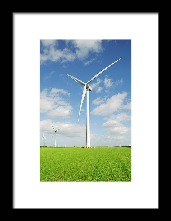 Environmental Conservation Framed Print featuring the photograph Wind Turbine In Rural Landscape by Mischa Keijser