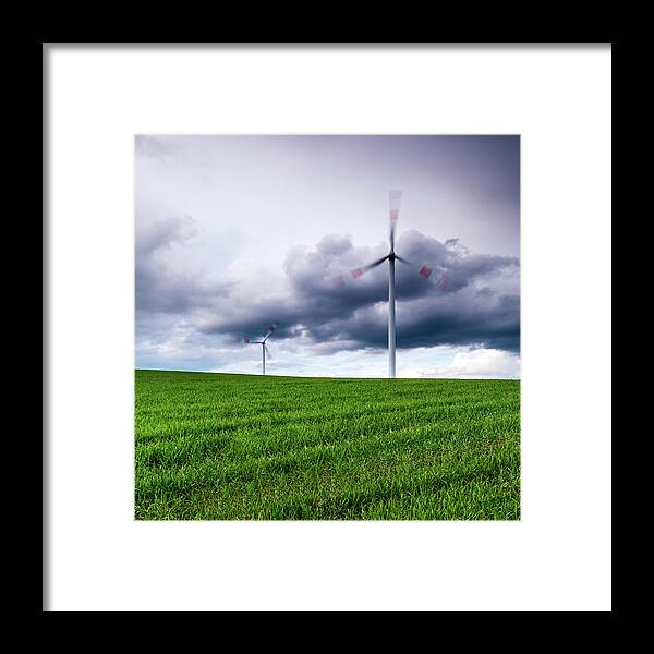 Scenics Framed Print featuring the photograph Wind Turbines On A Green Meadow by Mf-guddyx