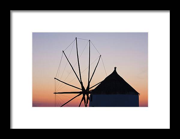 Triangle Shape Framed Print featuring the photograph Windmill At Sunset by Arturbo