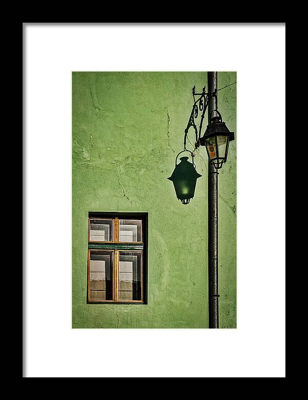 Sighisoara.romania Framed Print featuring the photograph Window Streetlight and Shadow - Romania by Stuart Litoff