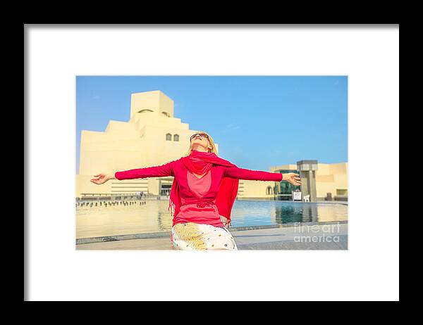 Doha Framed Print featuring the photograph Woman at Doha museum by Benny Marty