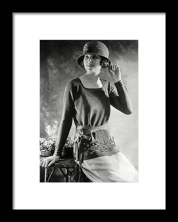 Sweater Framed Print featuring the photograph Woman Modeling Sweater And Hat by Bettmann