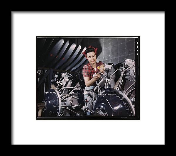 Hair Framed Print featuring the painting Woman working on an airplane motor by Palmer, Alfred T
