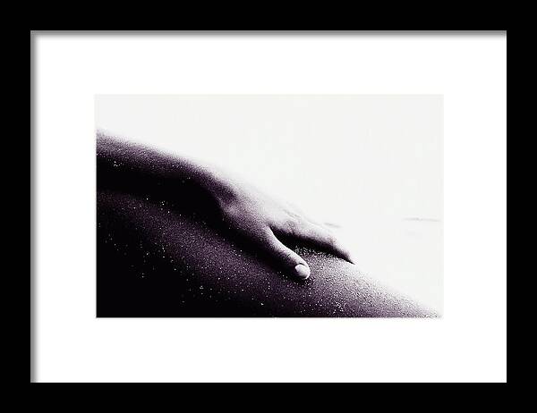 People Framed Print featuring the photograph Womans Hand Resting On Leg, Close-up B&w by Jerome Tisne